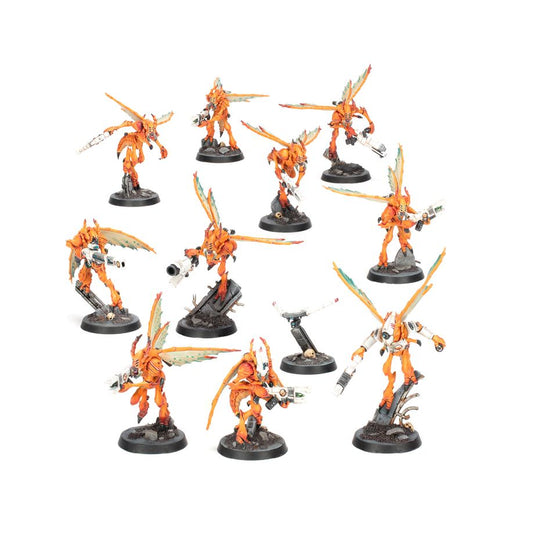 Collection of orange and black vespid miniatures on a white background