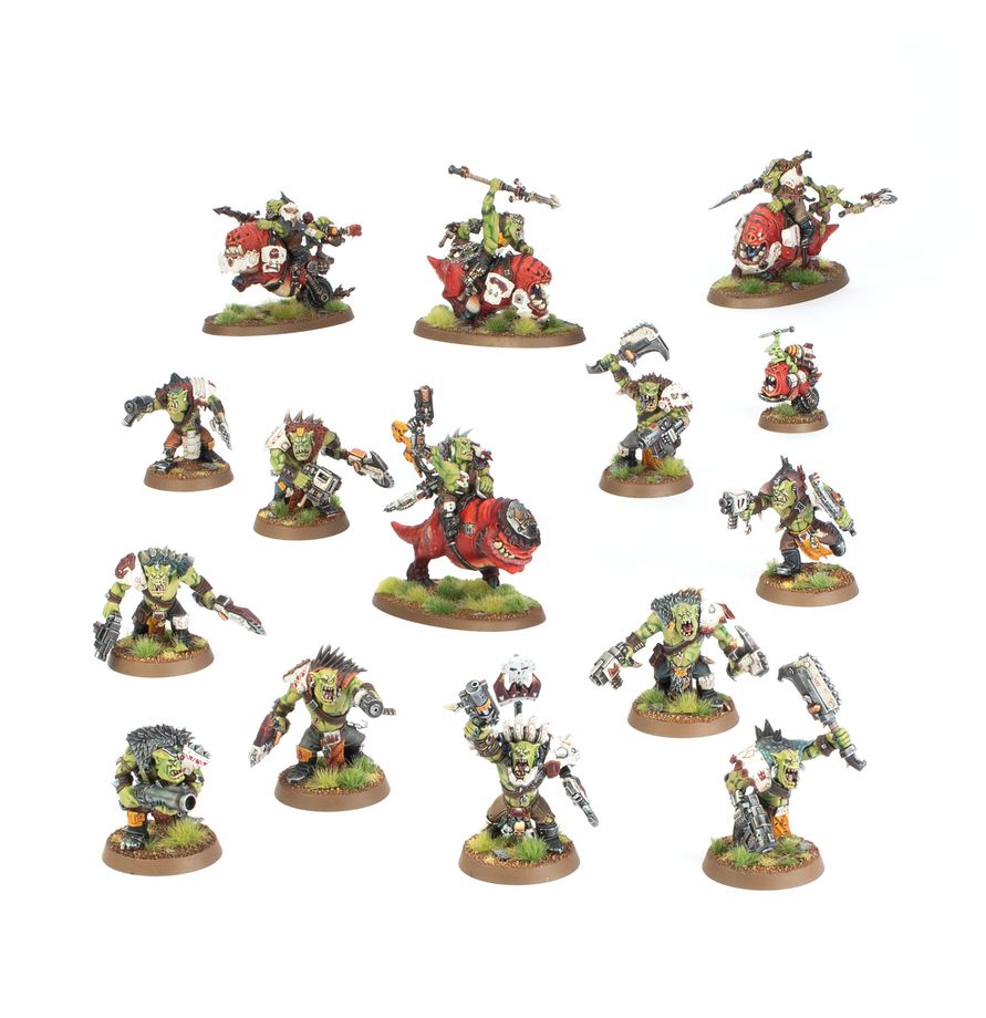 A set of painted fantasy miniature figures arranged on a plain white background. The figures appear to be a coordinated tabletop gaming or model kit set, with multiple green-skinned armored characters on round bases.