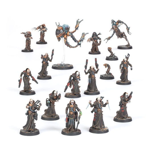 A set of painted fantasy tabletop miniatures arranged on a plain white background. The figures include skeletal warriors, robed wizards, and a large floating creature on a clear stand.