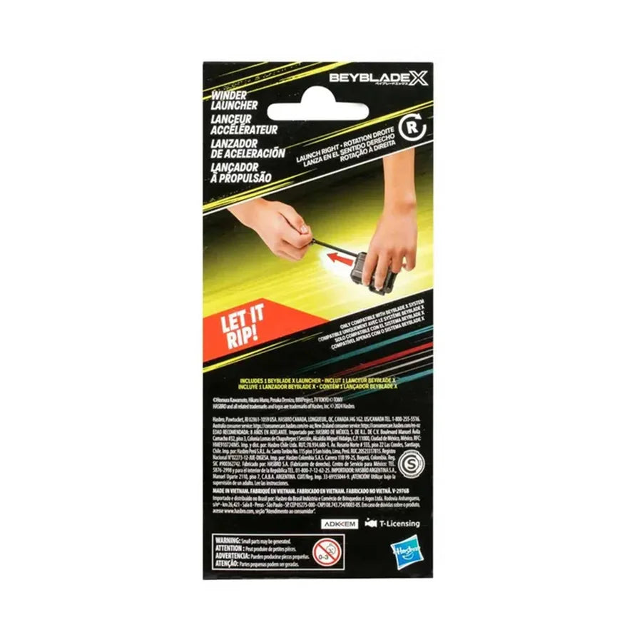 Beyblade X Winzer Launcher retail packaging card, showing product instructions, hands demonstrating use, and Hasbro branding on a black, yellow, and red design.