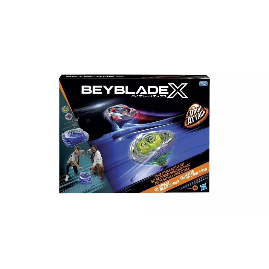 Beyblade X Drop Attack toy set retail box on a plain white background, showing Beyblade tops and action graphics on the packaging.